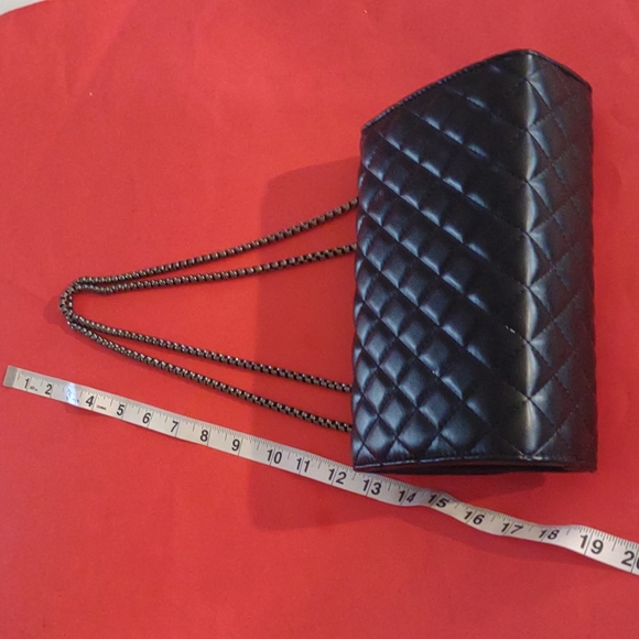 Black quilted evening bag with silver chain handle and metal fold over clasp - Picture 4 of 6